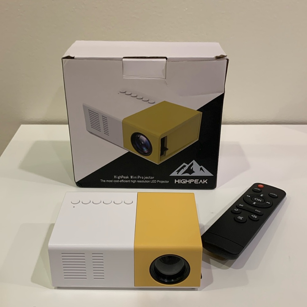 Used only once HighPeak Mini Projector with Remote